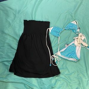 speedy bathing suit and a black cover up